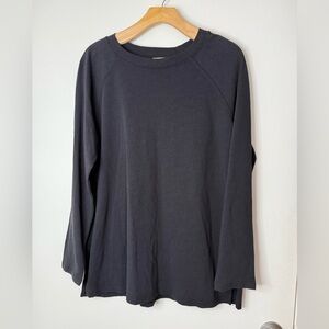 Eileen Fisher, black long sleeve pop over top with side slits. S